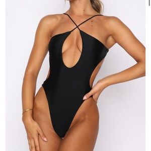 White fox swimsuit size small, never worn